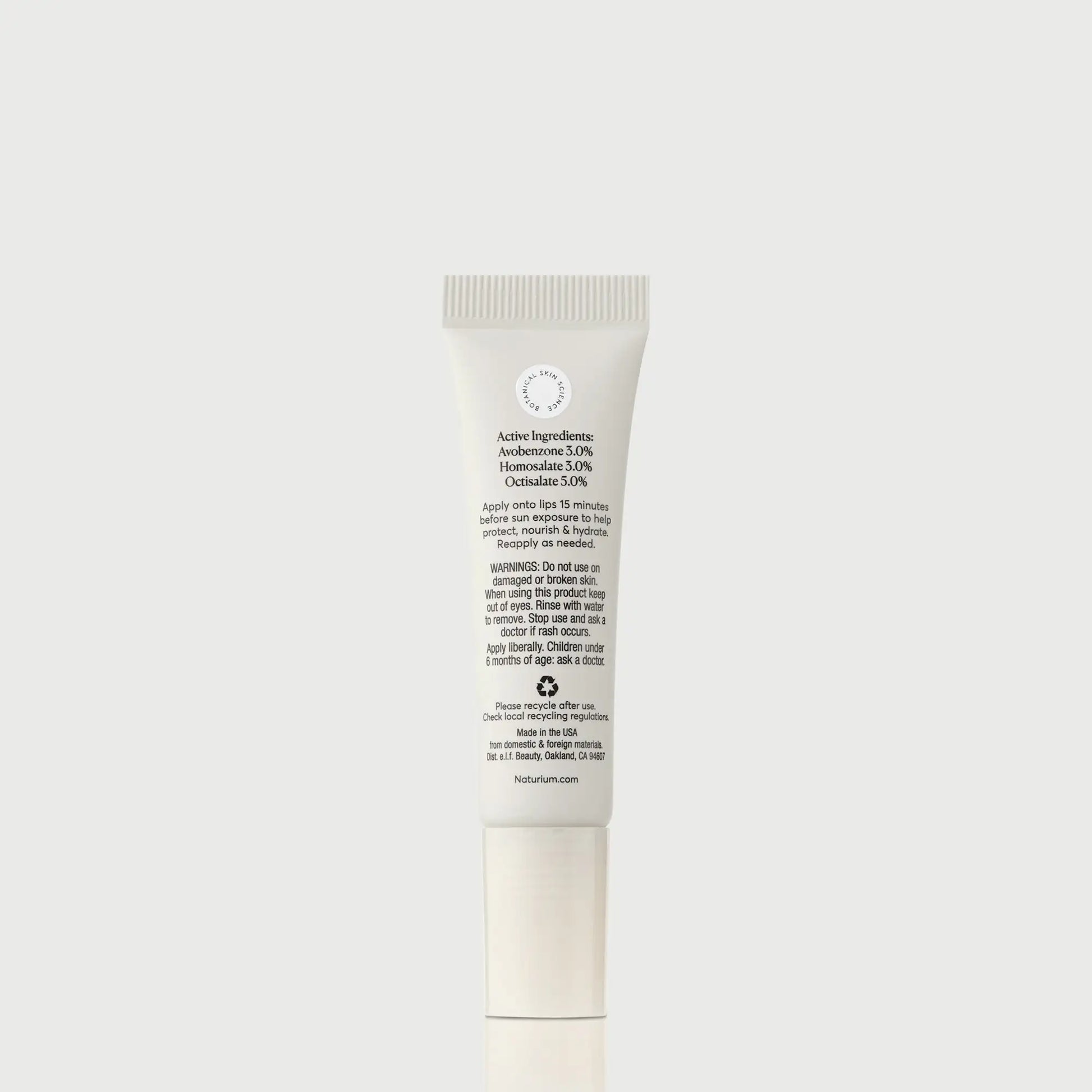 phyto-glow-lip-balm-spf-45-clear-l8 NATR-10124_PhytoGlow_SPF_Clear_primary_capon_back_bonebkgd_1.webp