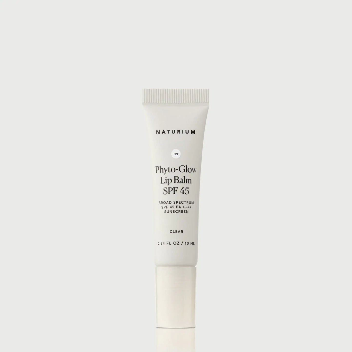 phyto-glow-lip-balm-spf-45-clear-l8 NATR-10124_PhytoGlow_SPF_Clear_primary_capon_front_bonebkgd_1.webp