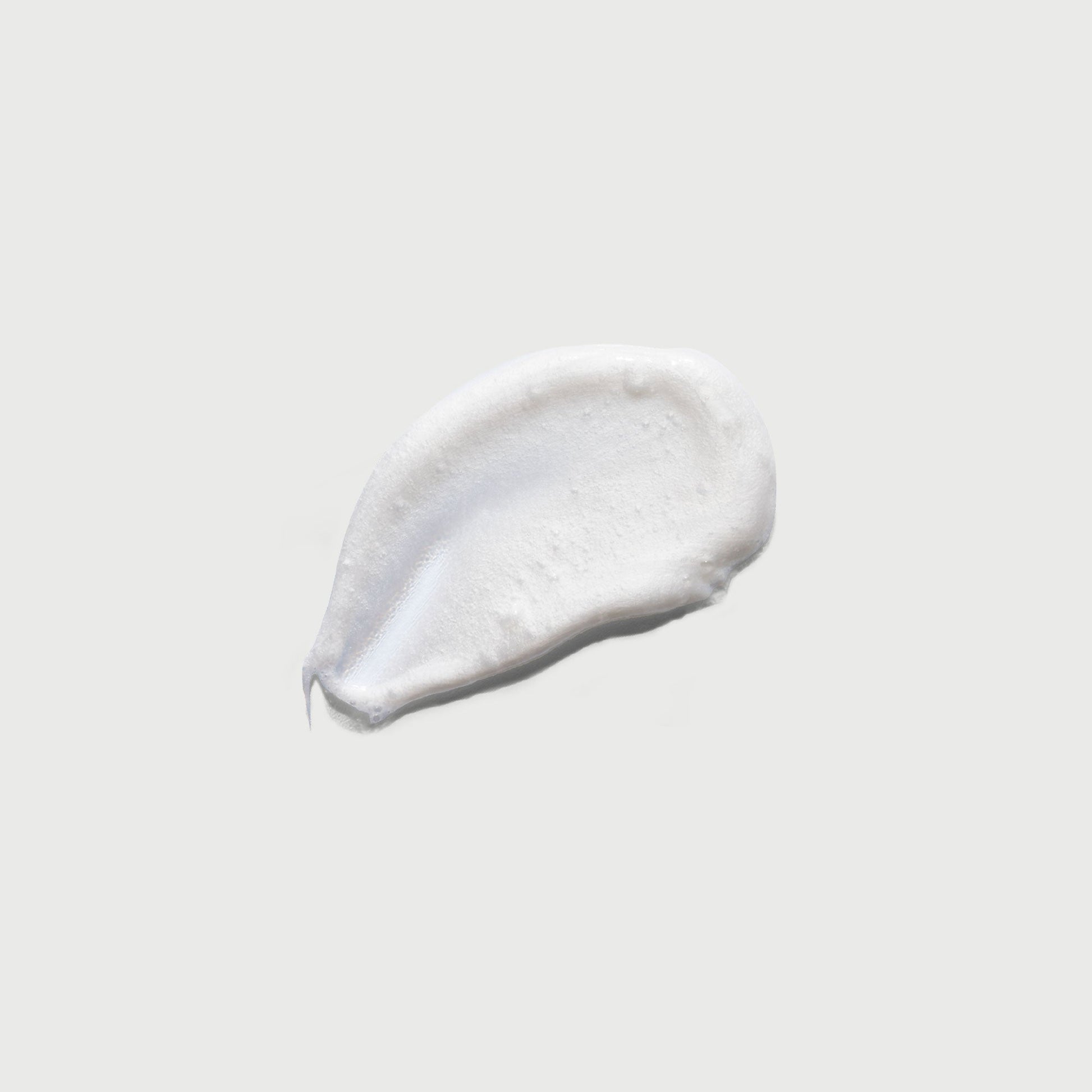 the-smoother-glycolic-acid-exfoliating-body-wash-y4 NATR-40002-Swatch-The-Smoother-Glycolic-Acid-Exfoliating-Body-Wash-bonebkgd.jpg