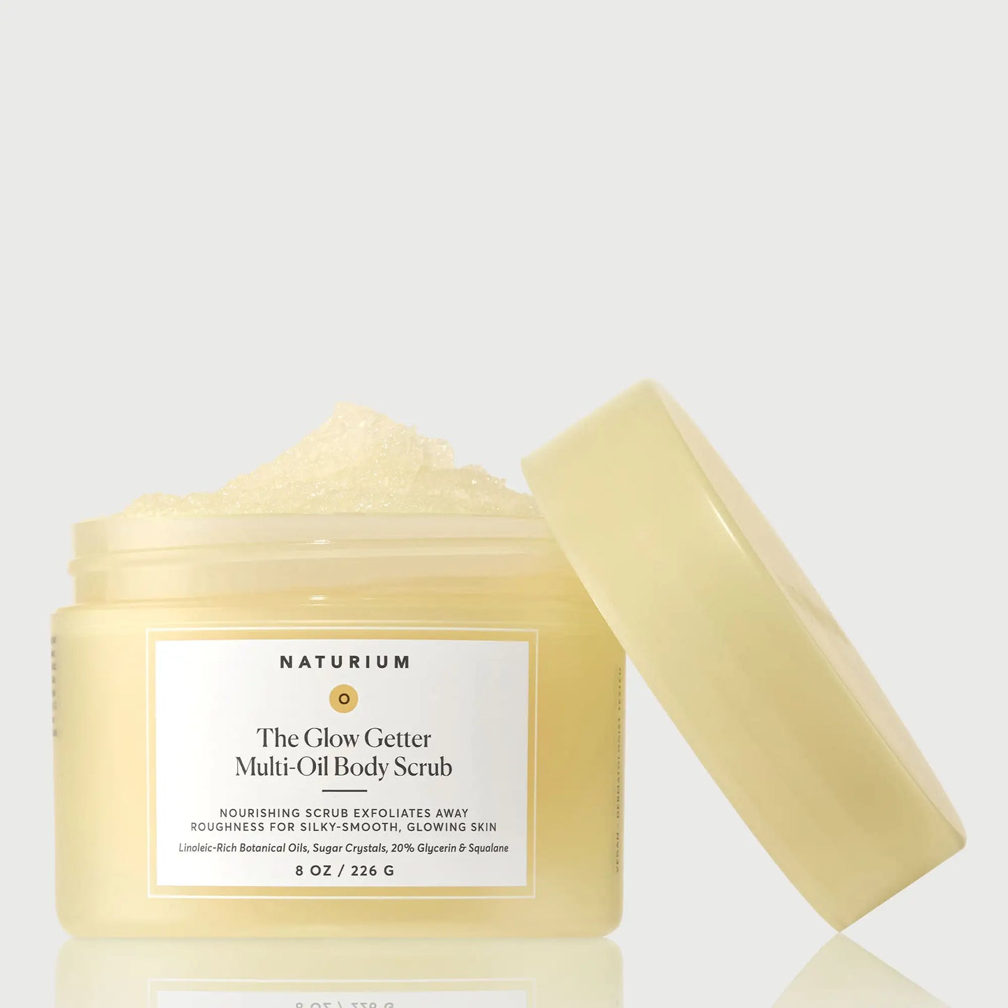the-glow-getter-multi-oil-body-scrub-p7 NATR-40028-GlowGetter-Multi-Oil-Body-Scrub-Front-CapOff-bonebkgd.webp