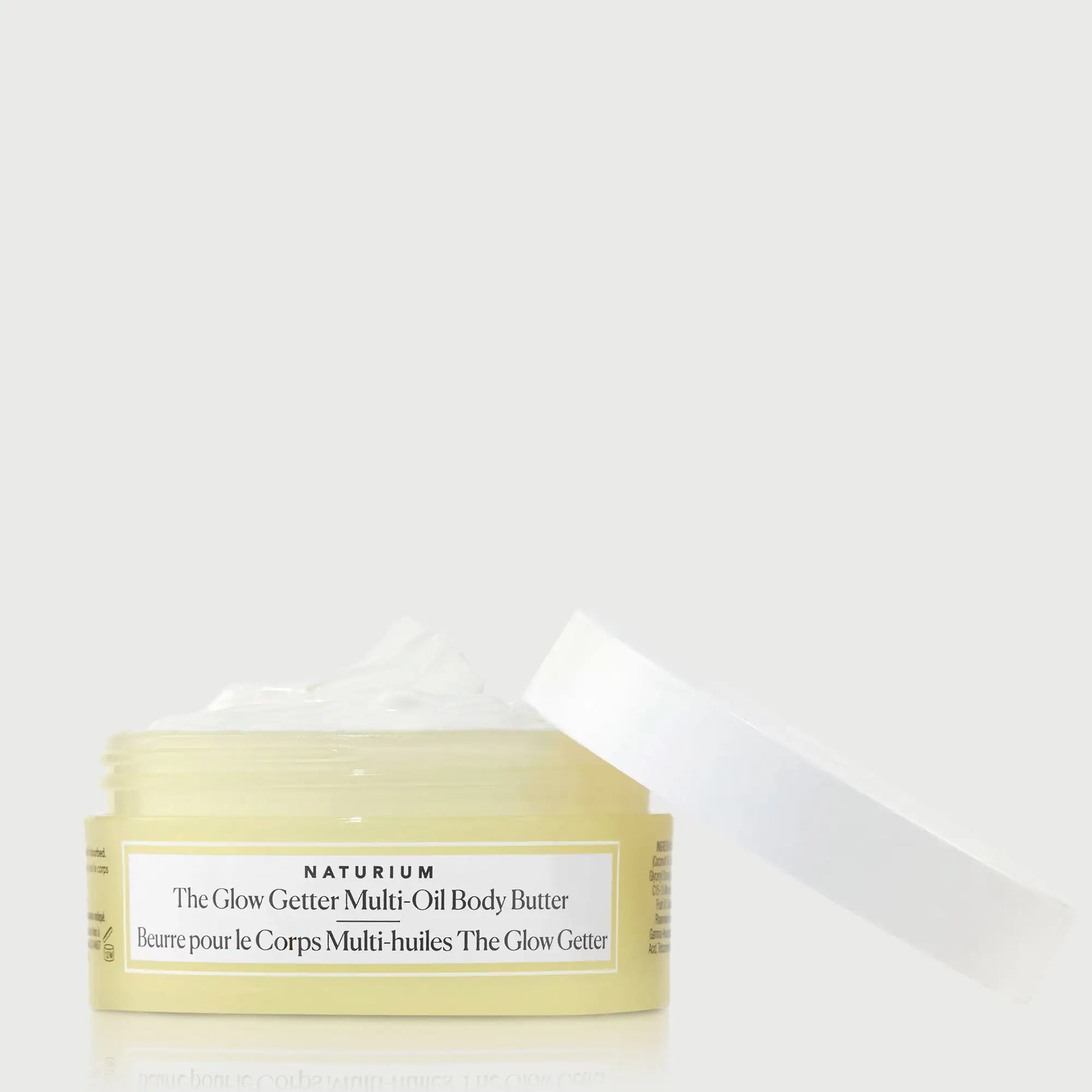 the-glow-getter-multi-oil-body-butter-travel-size-i8 NATR-40115_Glow-Getter-Body-Butter-Mini_front_capoff_bonebkgd.webp