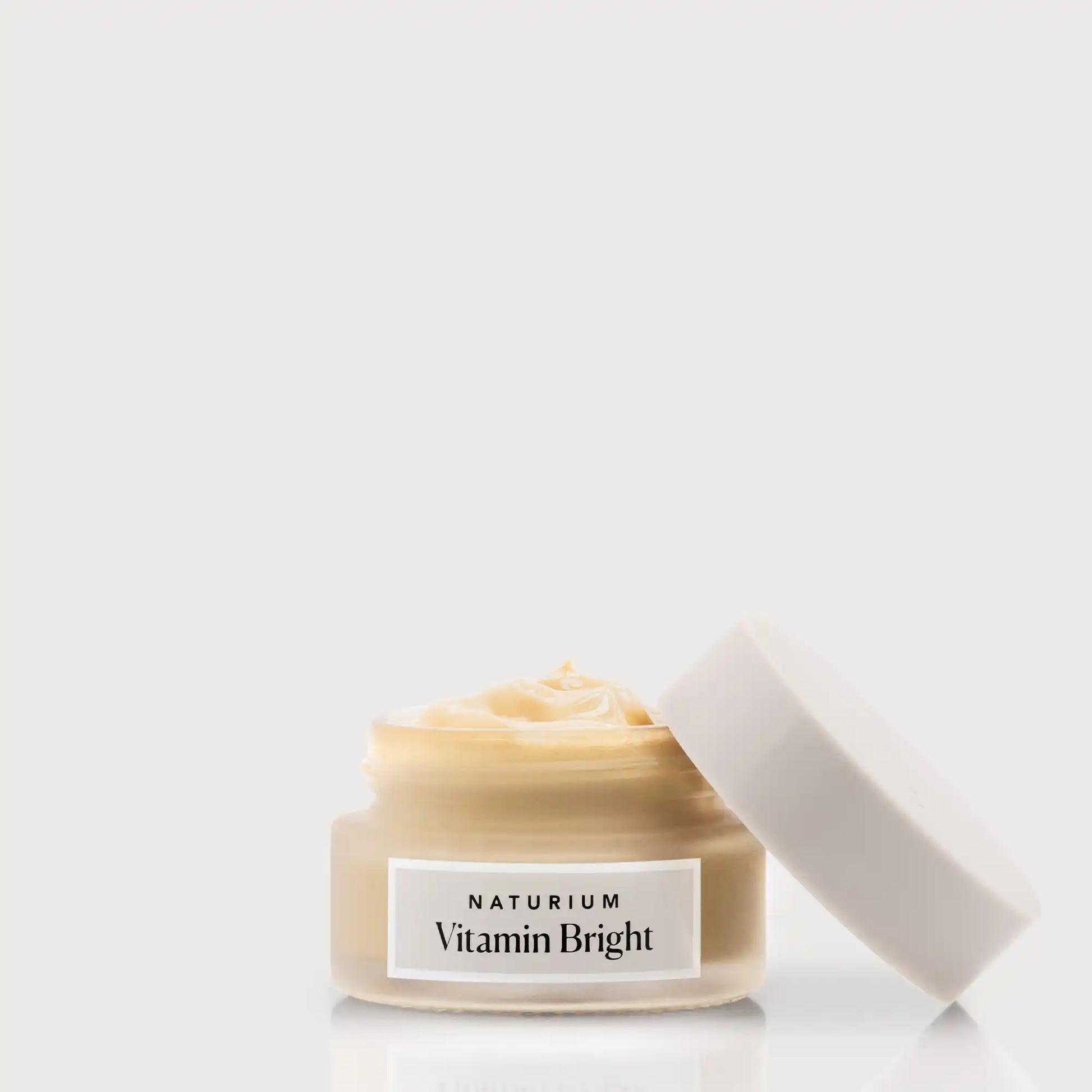vitamin-bright-illuminating-eye-cream-w9 NATR-VitaminBright_LIGHT_Primary_front_openjar_bone.webp