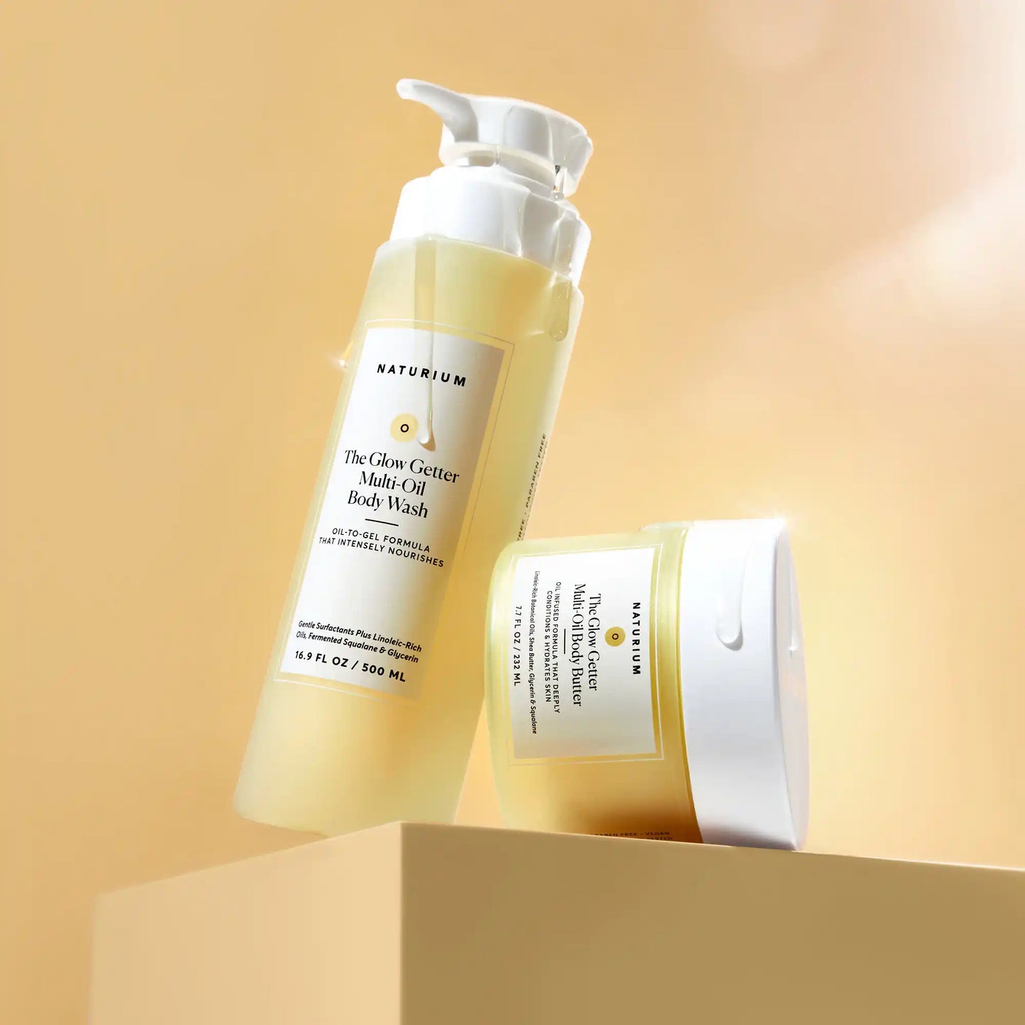 the-glow-all-out-body-bundle-i2 gg-bodybutter_1464-crop_revcolor_FL.webp
